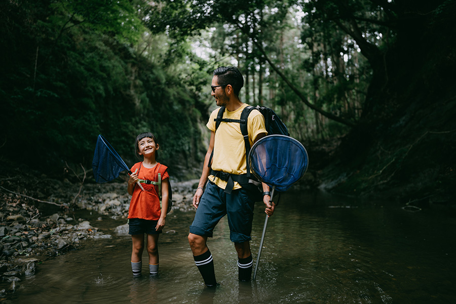 People walking in a stream
