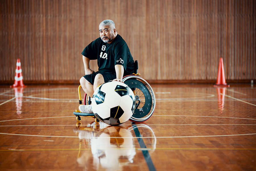 Football player in wheel chair