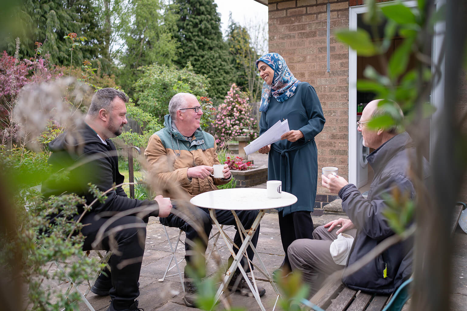 Group gathering in a garden