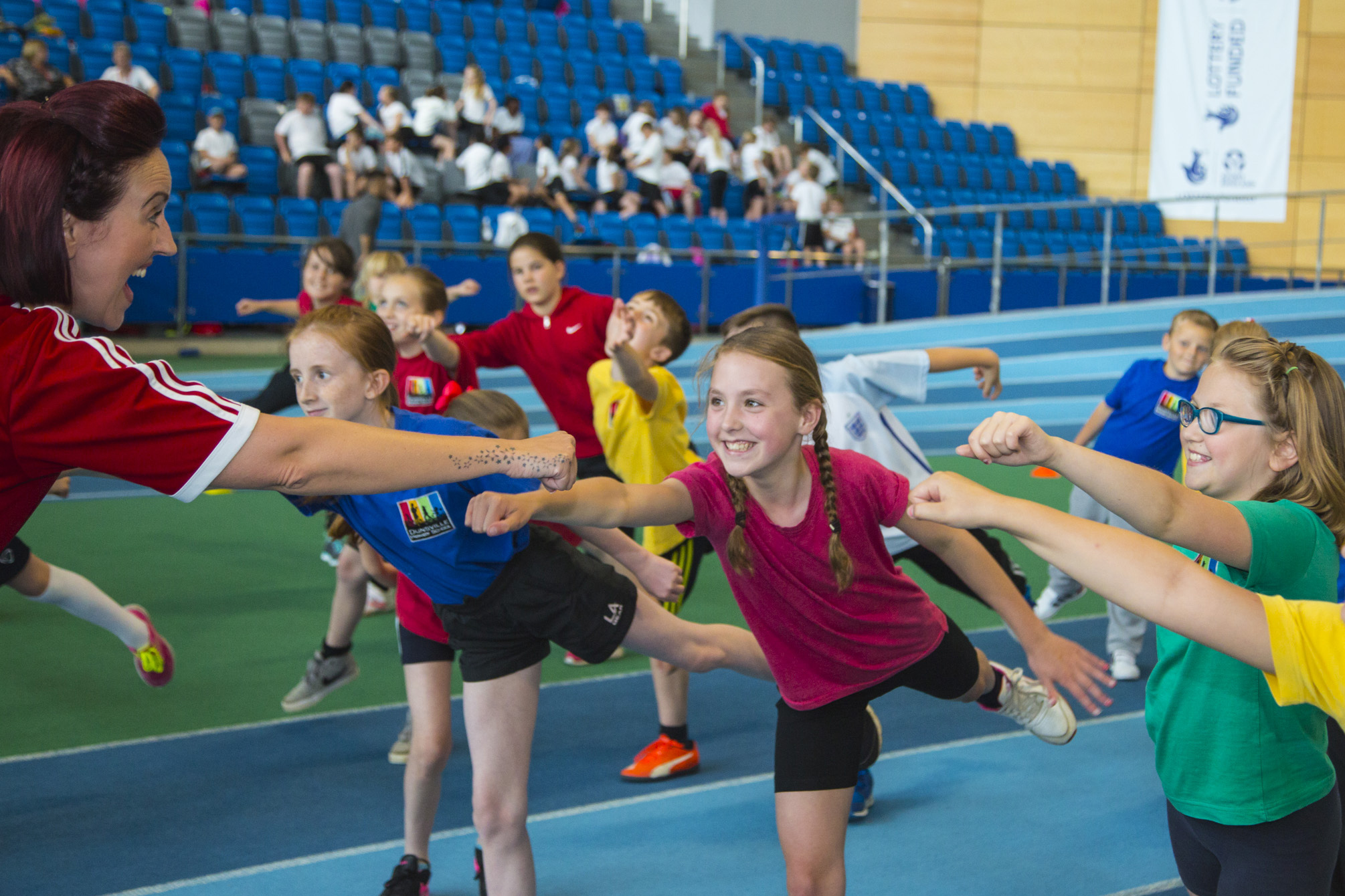 A group of children doing exercise
