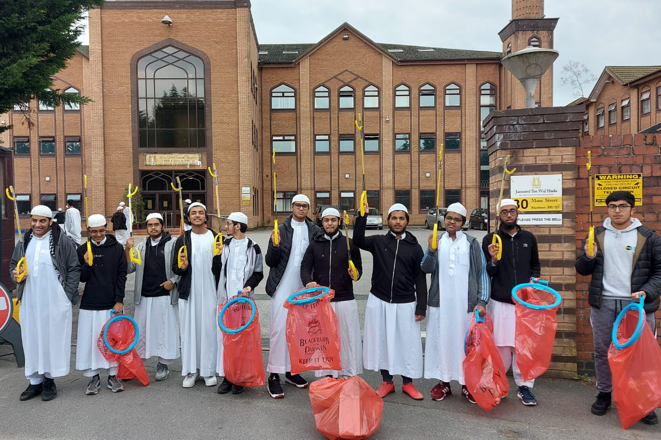 A group of people litter picking