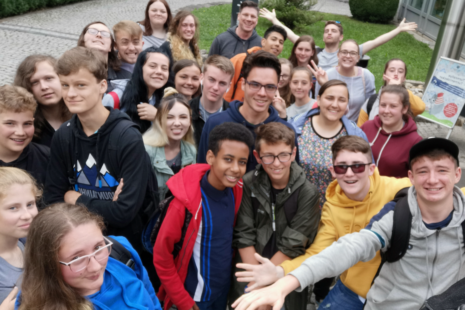 A group of young people posing for the camera