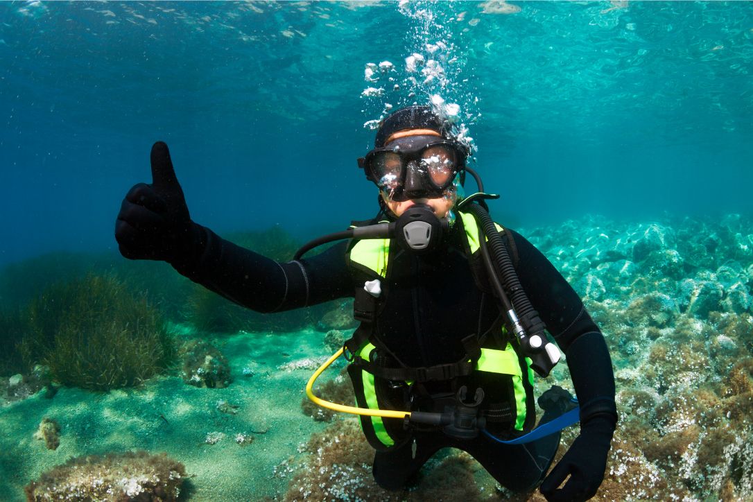 Scuba diver giving thumbs up