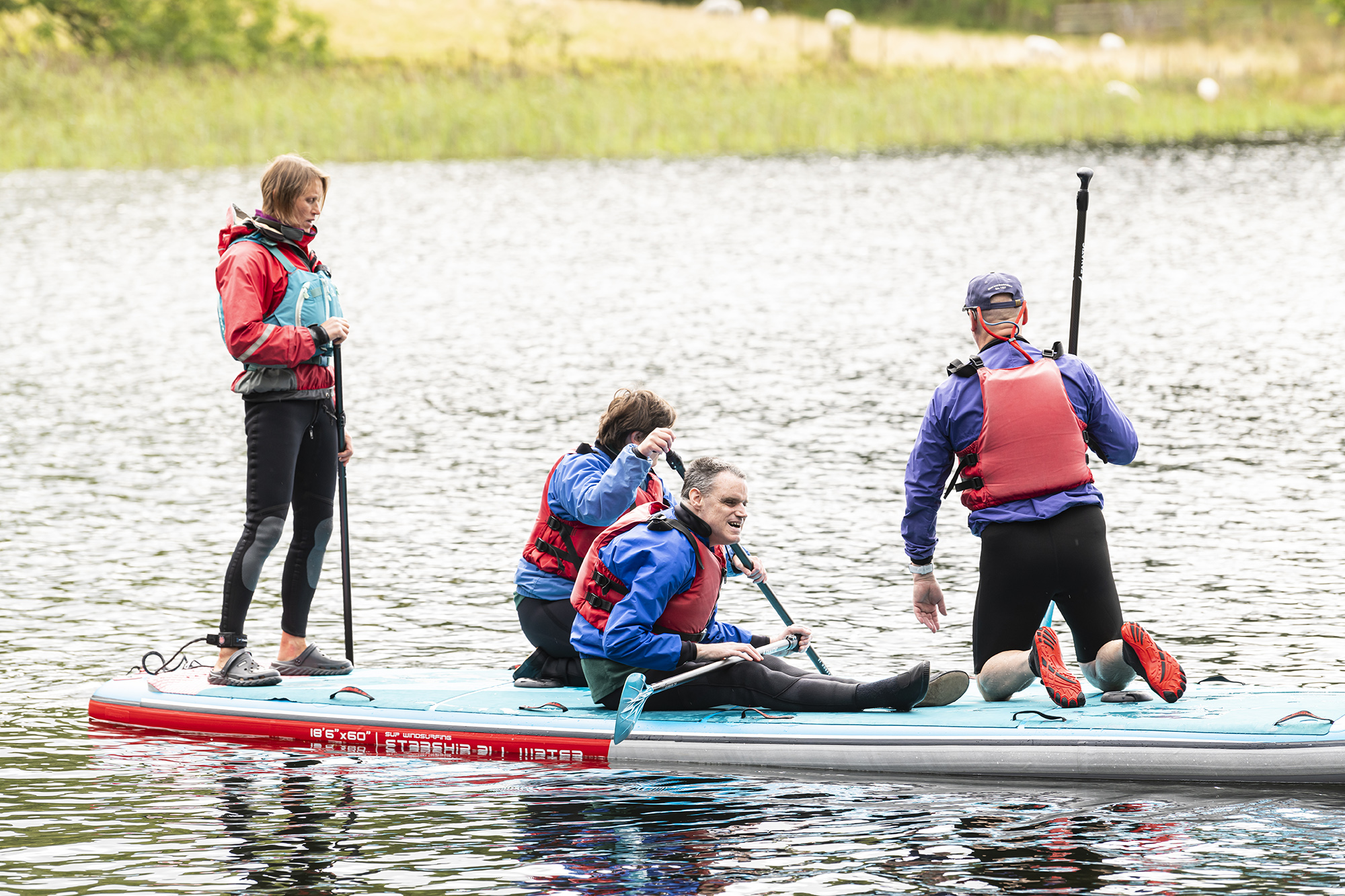 Pilotlight Partner Charity_Galloways A group of people paddle boarding