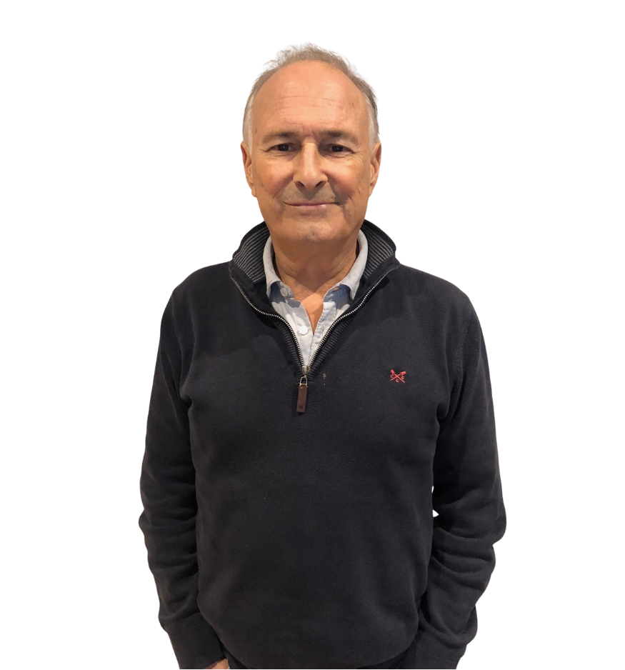 Trustee David Wilkinson wears a black zip-up fleece and smiles at the camera